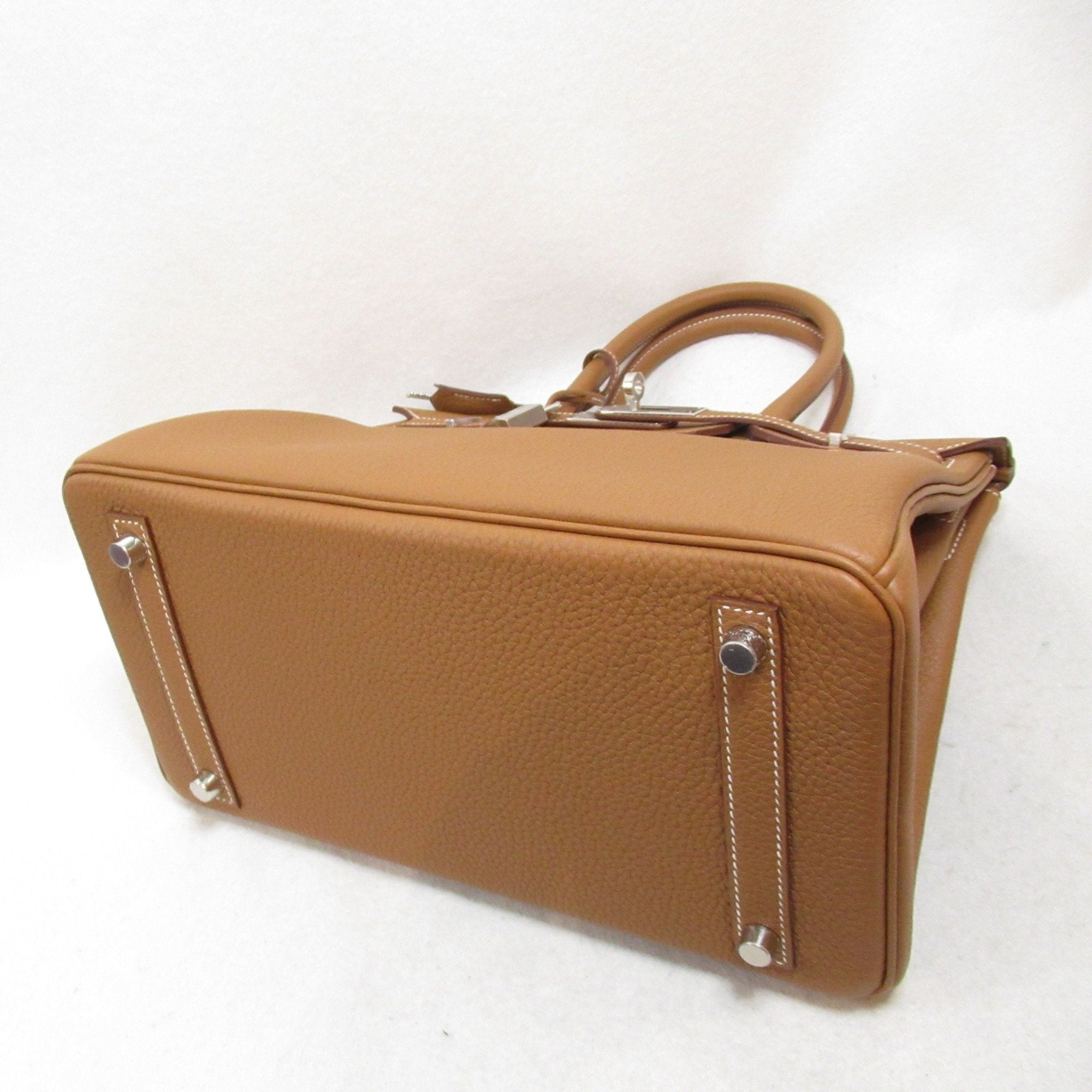 Pre-owned Hermes Birkin 30 handbag expertly crafted from Fauve Barenia Faubourg Togo leather and palladium hardware