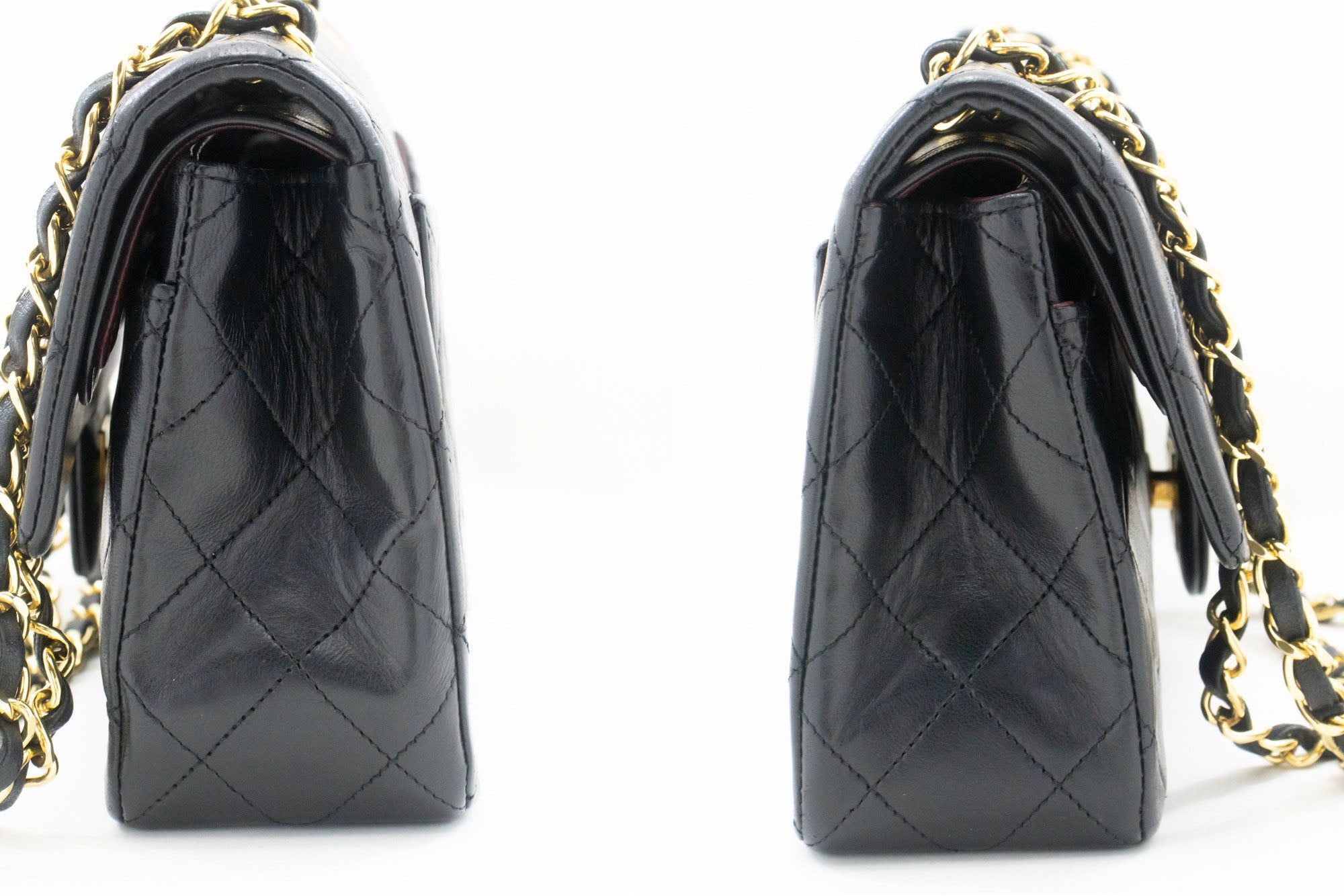 Vintage Chanel Timeless double flap handbag comes in classic black color