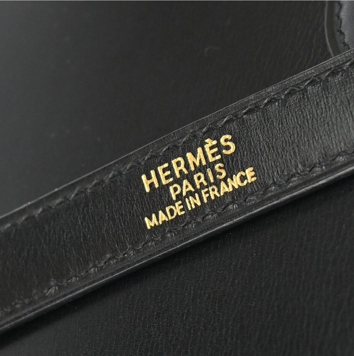 Black Hermes Kelly 28 handbag with a strap