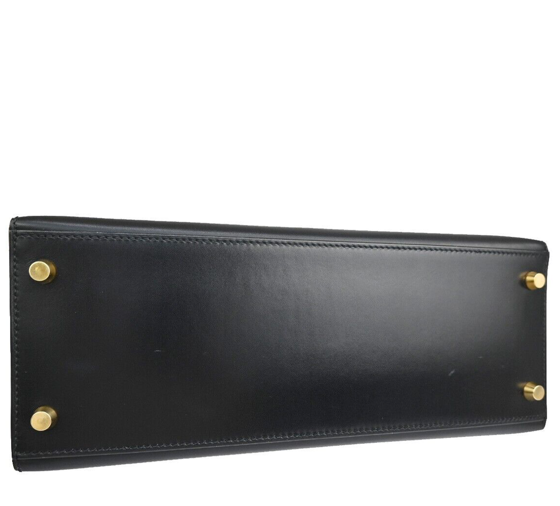 Black Hermes Kelly 28 handbag with a strap