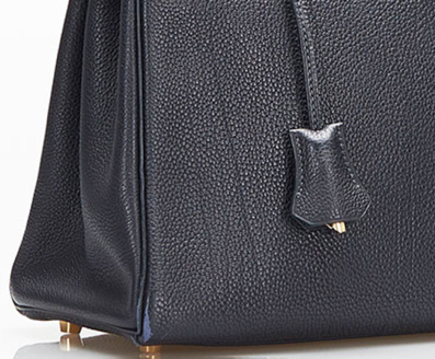 Hermès Kelly 32 Retourne handbag crafted in black Vache Ardennes leather