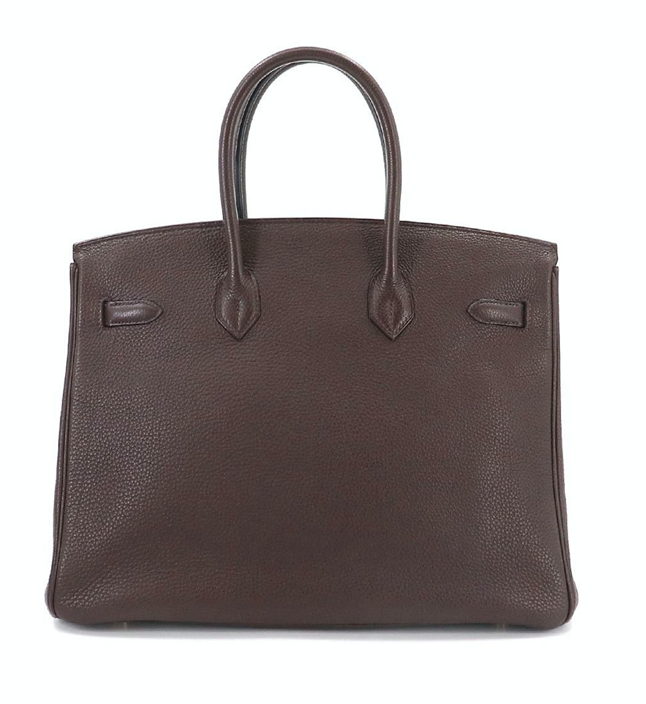 Brown Hermés Birkin 35 leather handbag with accessories
