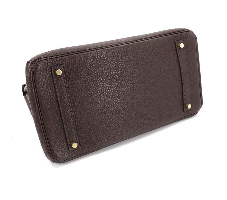 Brown Hermés Birkin 35 leather handbag with accessories