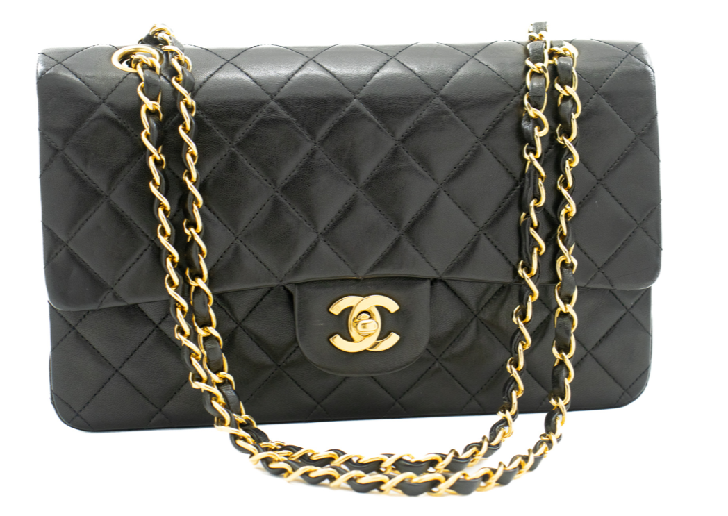 Classic Chanel handbag crafted from luxurious lambskin leather in a black hue