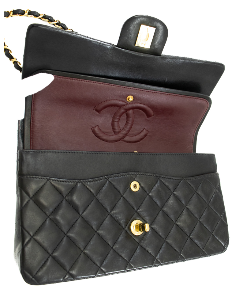 Classic Chanel handbag crafted from luxurious lambskin leather in a black hue