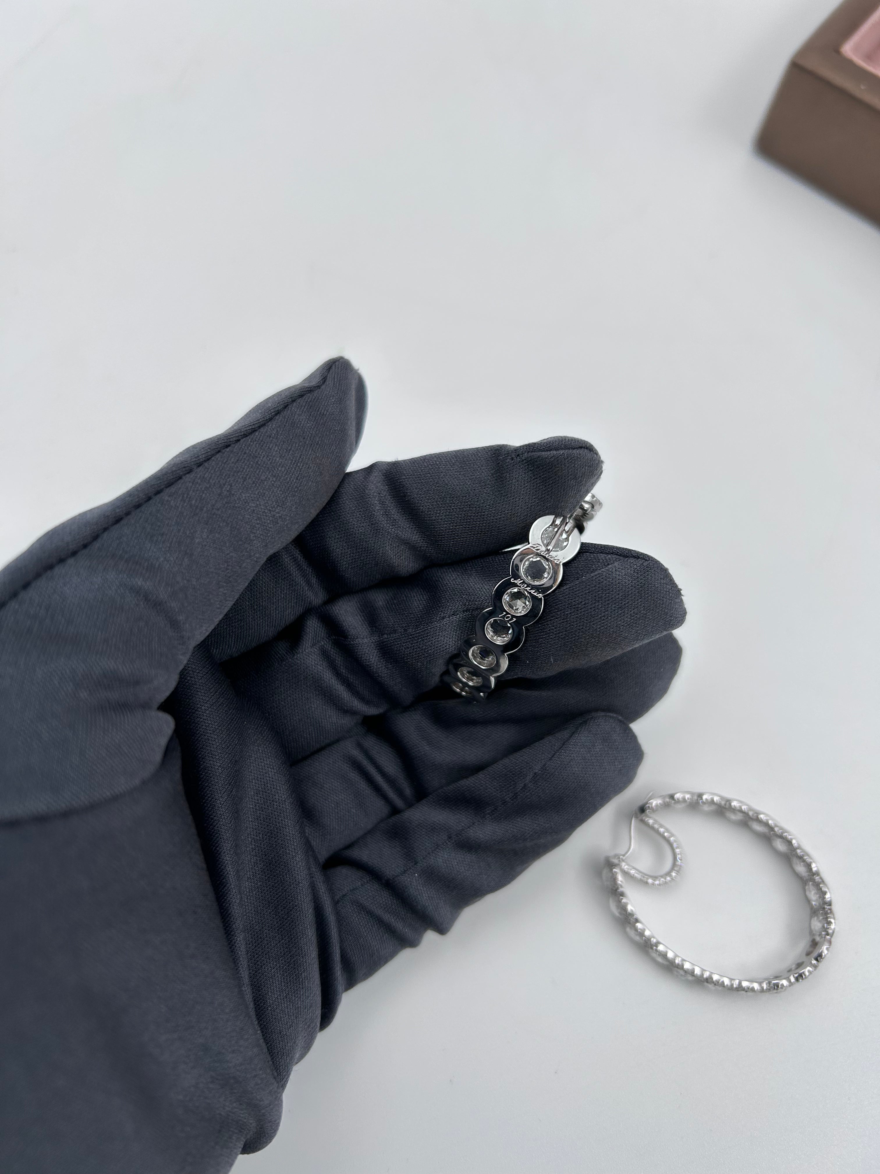 pre-owned 18k white gold David Morris 13.02 ctw rose cut diamond hoop "in-and-out" design earrings