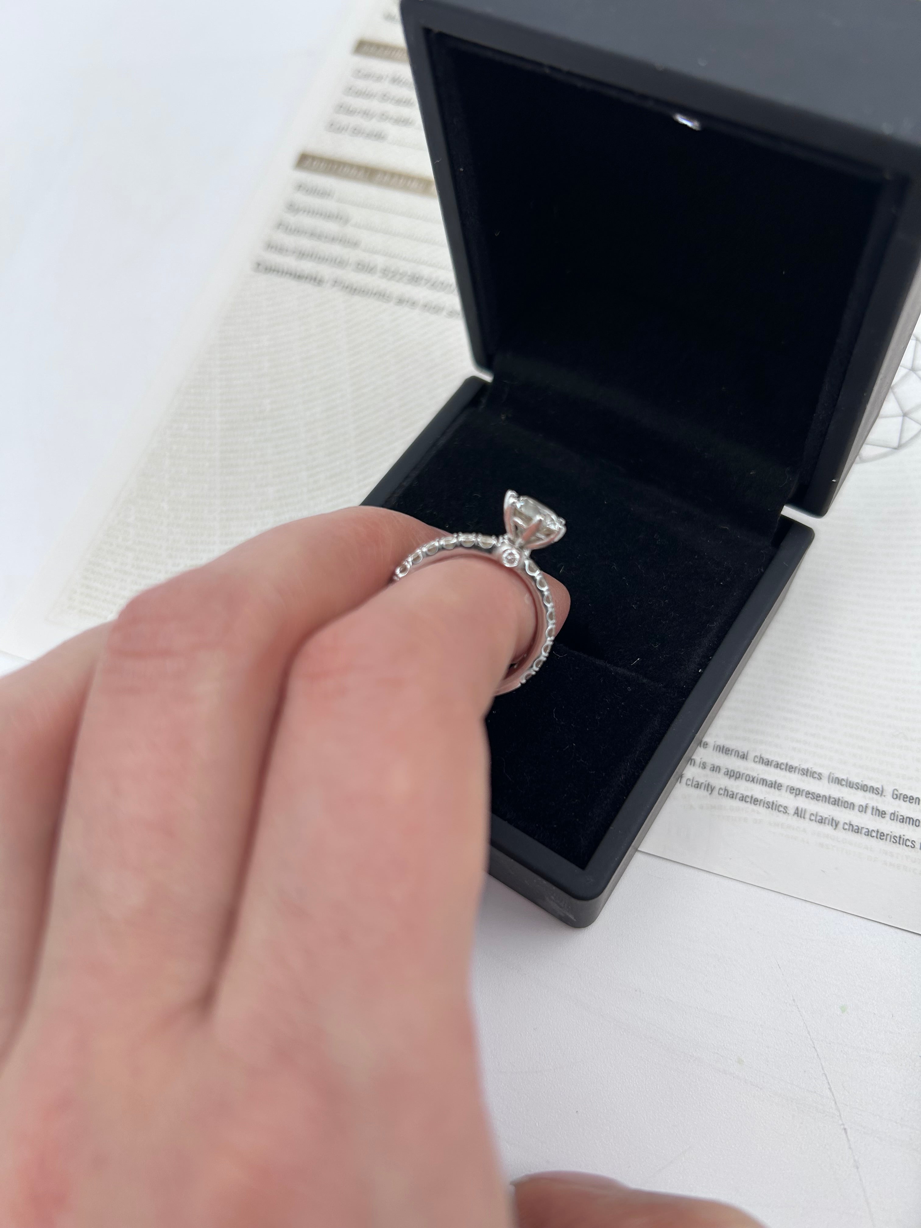 Pre-owned solitaire ring featuring a natural 1.20ct round brilliant diamond (VS2, H color)