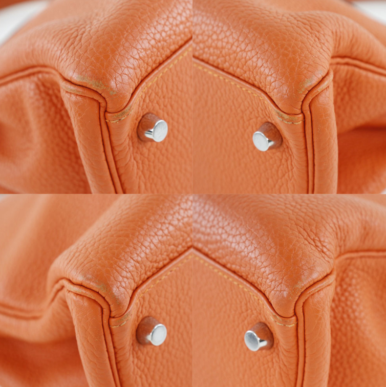 El bolso Clemence de cuero naranja Hermes Kelly 32 viene con accesorios