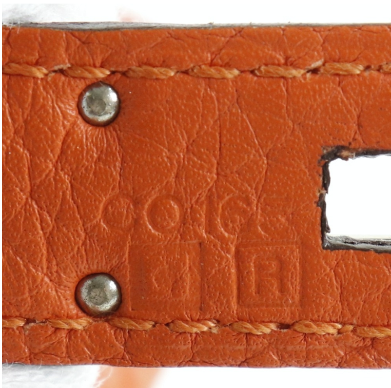 El bolso Clemence de cuero naranja Hermes Kelly 32 viene con accesorios