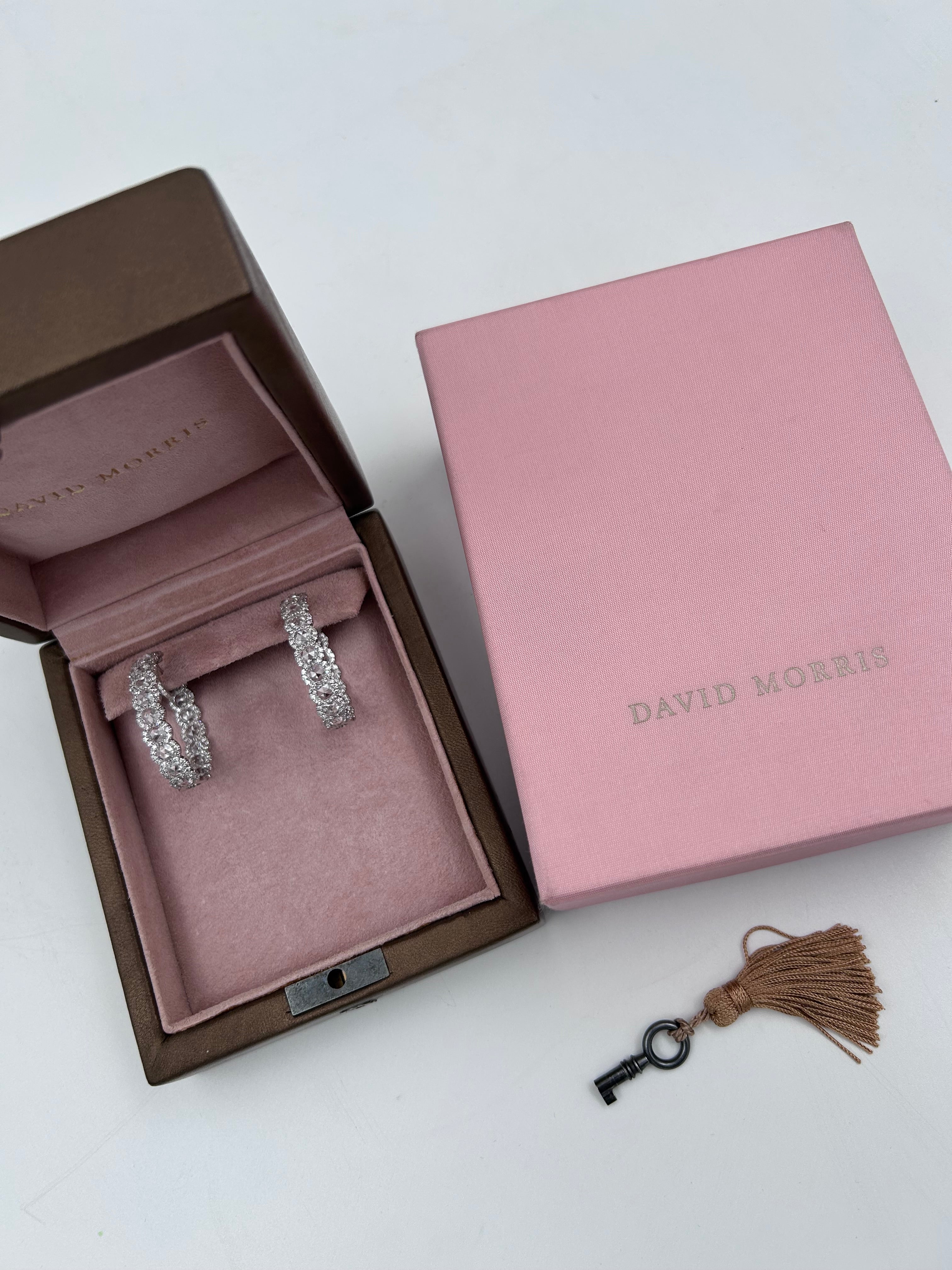 pre-owned 18k white gold David Morris 13.02 ctw rose cut diamond hoop "in-and-out" design earrings