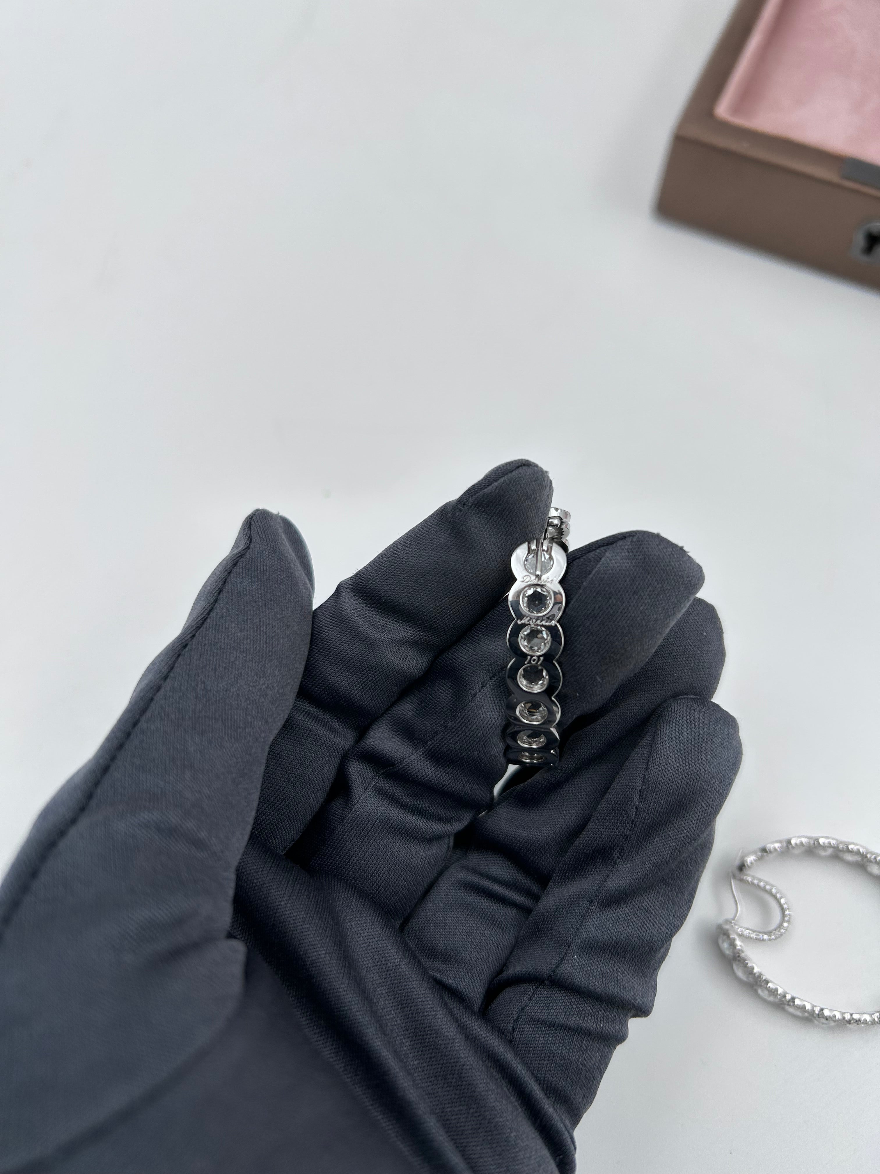 pre-owned 18k white gold David Morris 13.02 ctw rose cut diamond hoop "in-and-out" design earrings