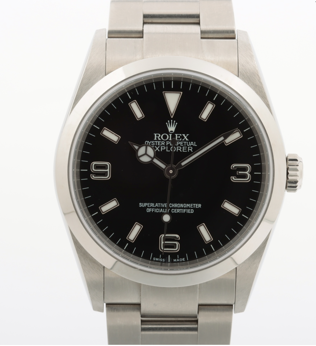 Full set Men's / Unisex stainless steel 36mm Rolex Explorer with a black dial and Arabic numerals. Ref. No. 14270