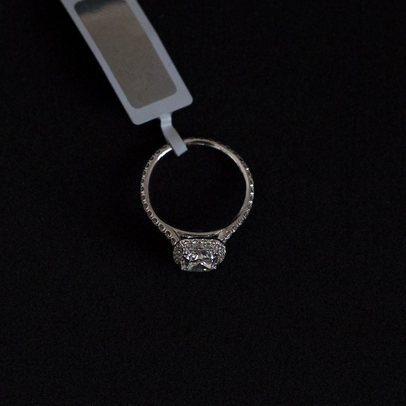 18K white gold engagement ring with a GIA certified 1.50ct cushion cut diamond