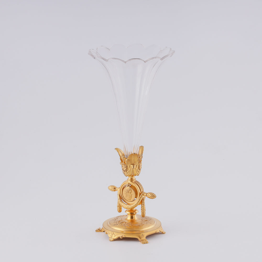 A 19th century crystal vase features two flower-shaped elements elegantly mounted on a giraldical gold-plated bronze plinth