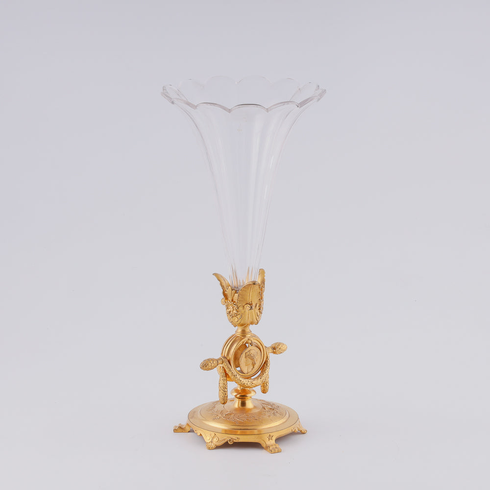 A 19th century crystal vase features two flower-shaped elements elegantly mounted on a giraldical gold-plated bronze plinth