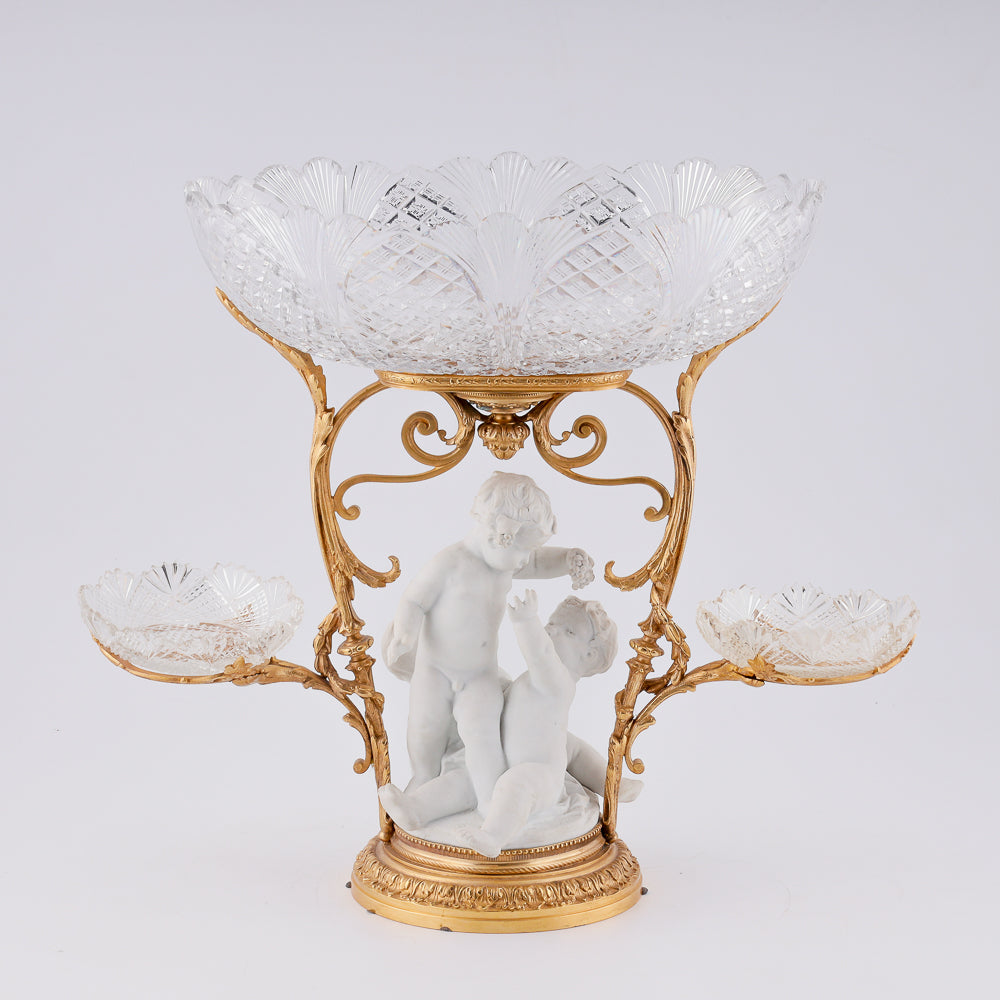 Large antique crystal dessert centerpiece with group of bisque porcelain putti