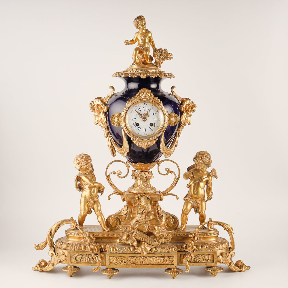 Large cobalt blue salon clock set with two vases