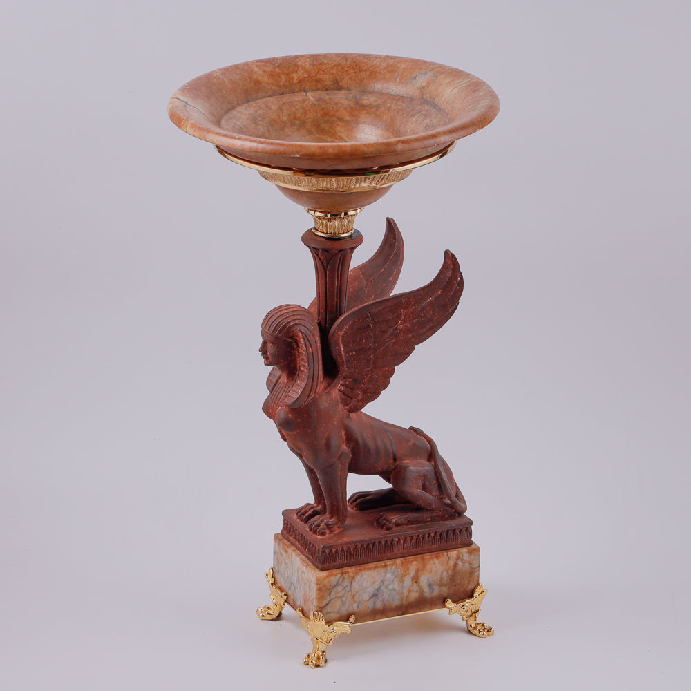 Large vintage marble vase features an exquisite iron cast sphinx