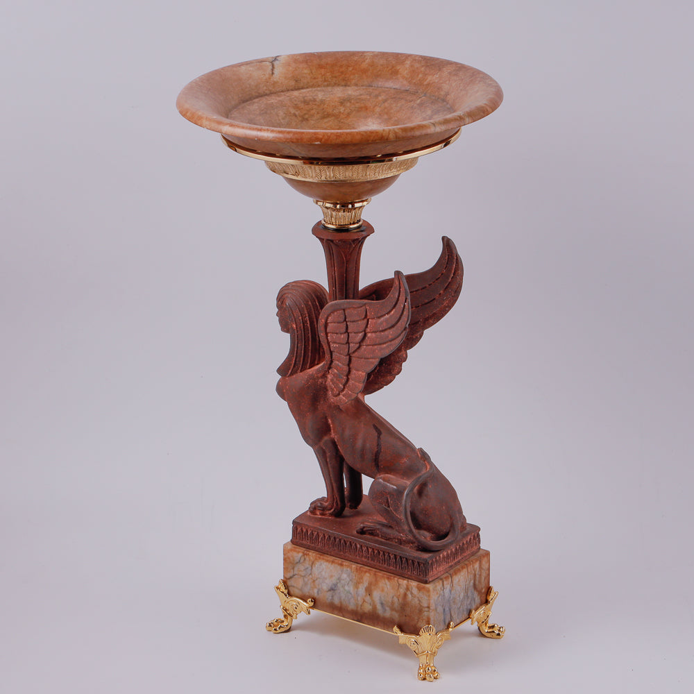 Large vintage marble vase features an exquisite iron cast sphinx