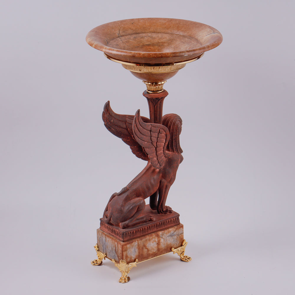 Large vintage marble vase features an exquisite iron cast sphinx