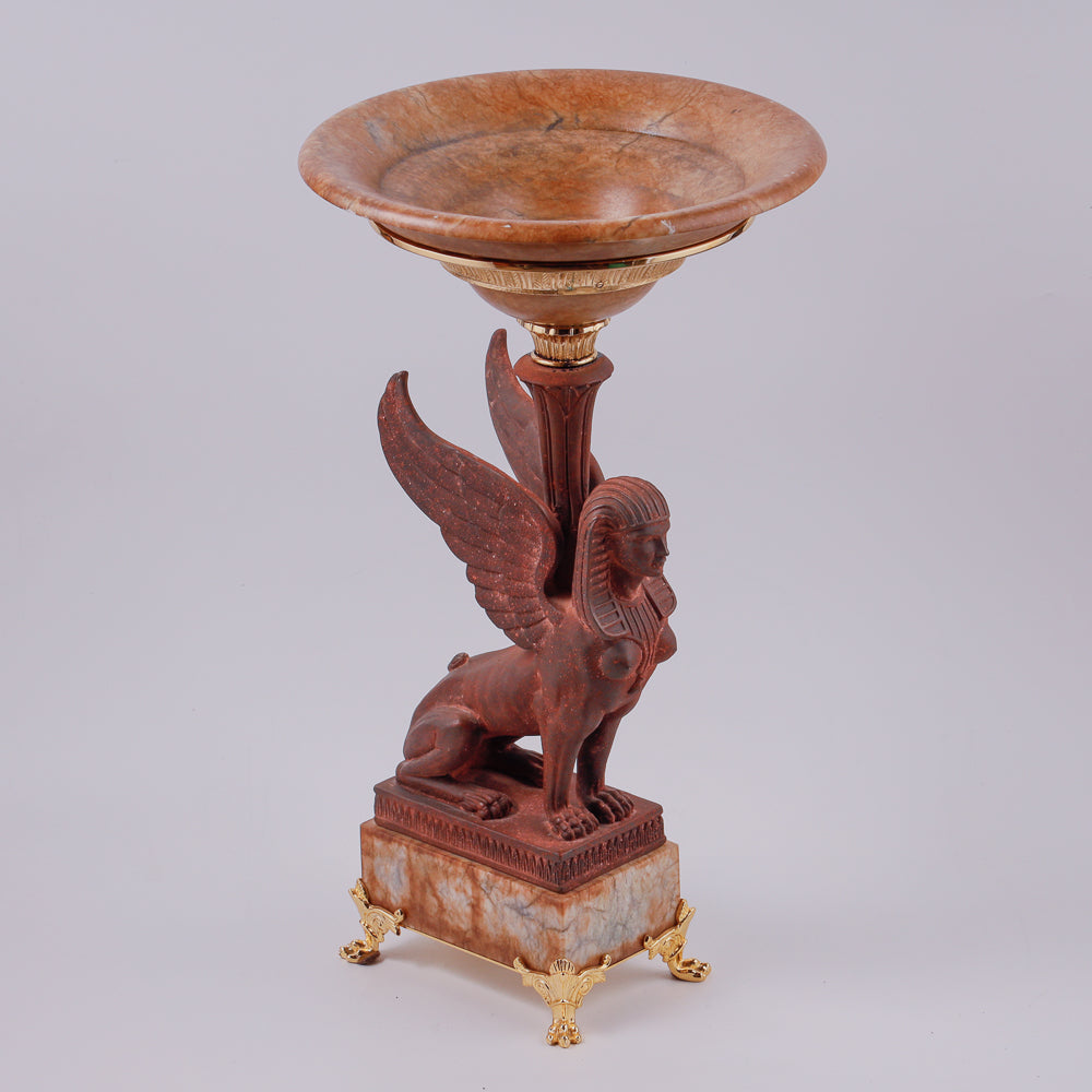 Large vintage marble vase features an exquisite iron cast sphinx