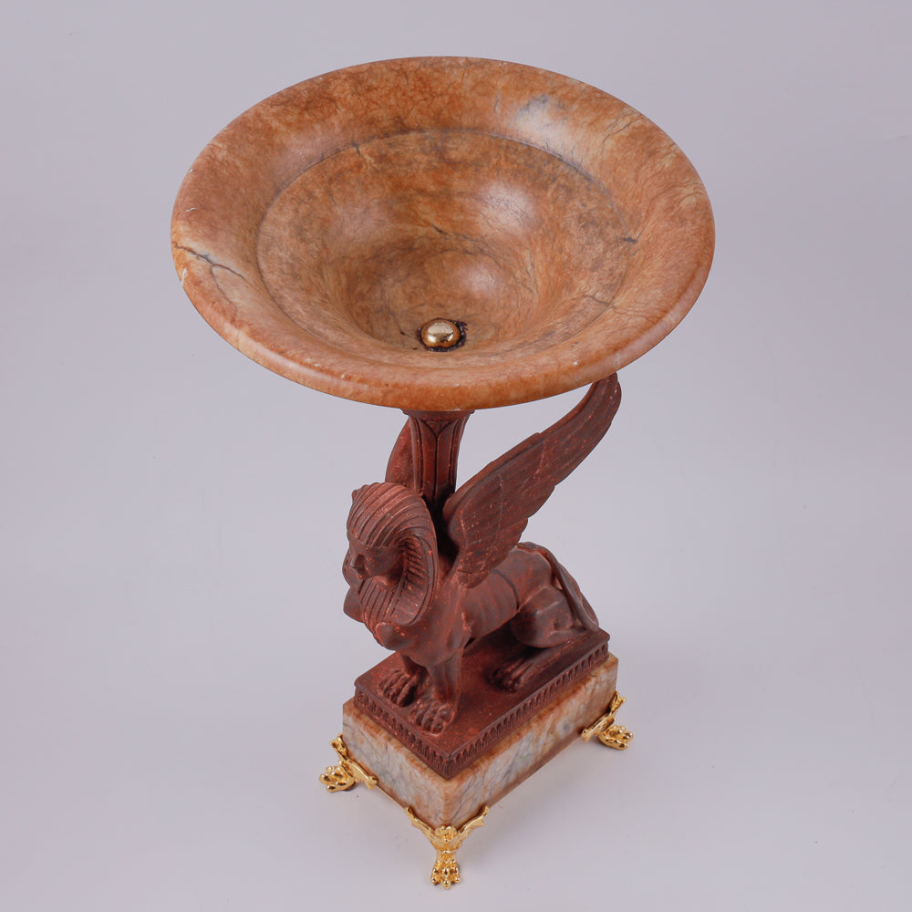 Large vintage marble vase features an exquisite iron cast sphinx