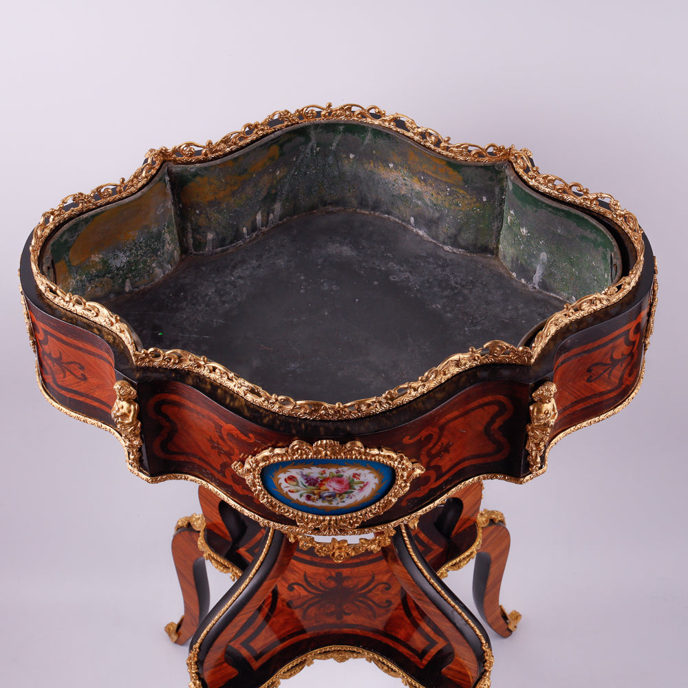 Antique Boulle plant stand showcases masterful hand carving and intricate marquetry inlay