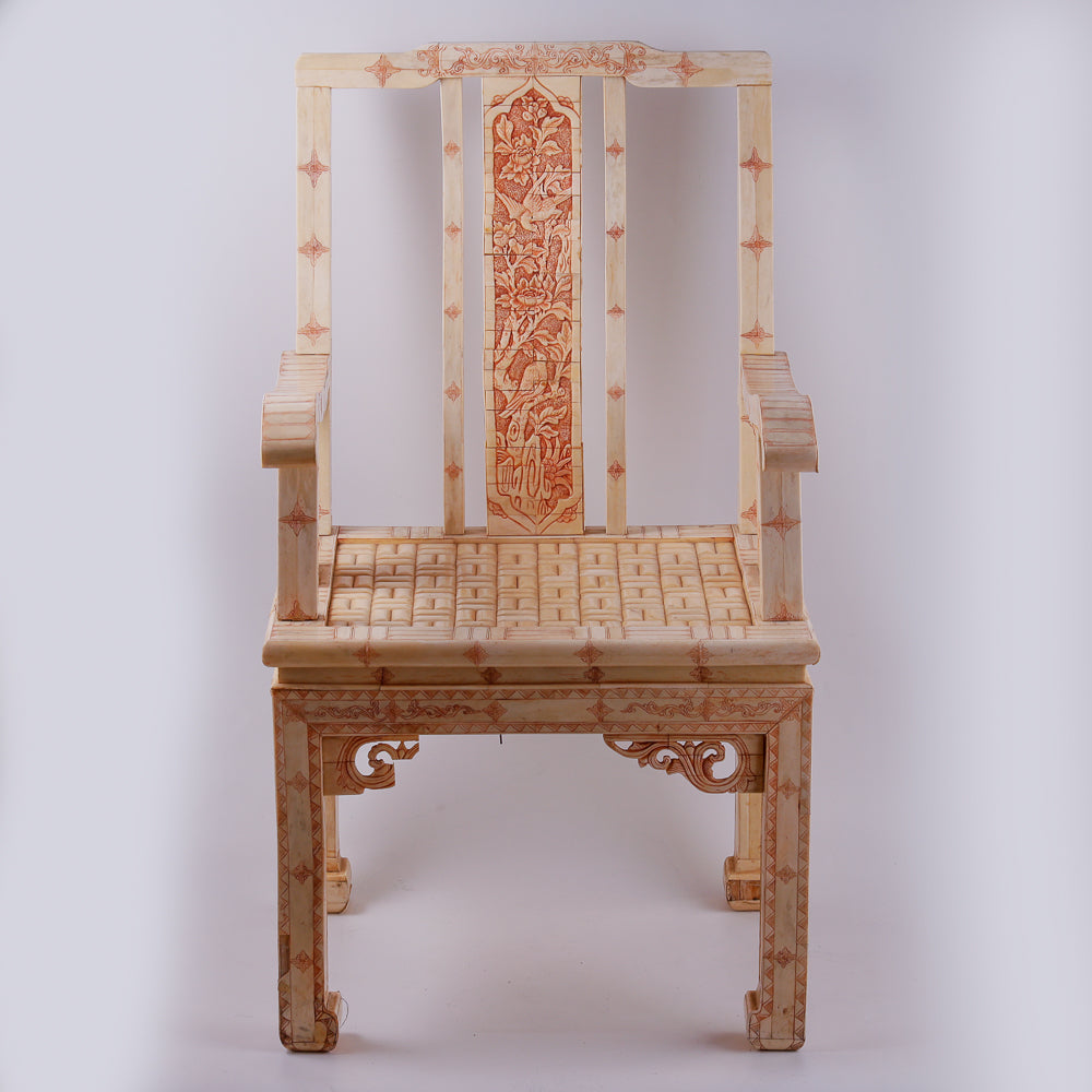 Pair of large ivory armchairs showcases intricate Asian inlay motifs