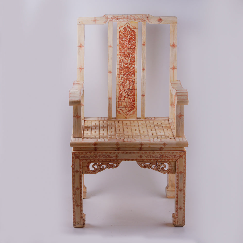 Pair of large ivory armchairs showcases intricate Asian inlay motifs