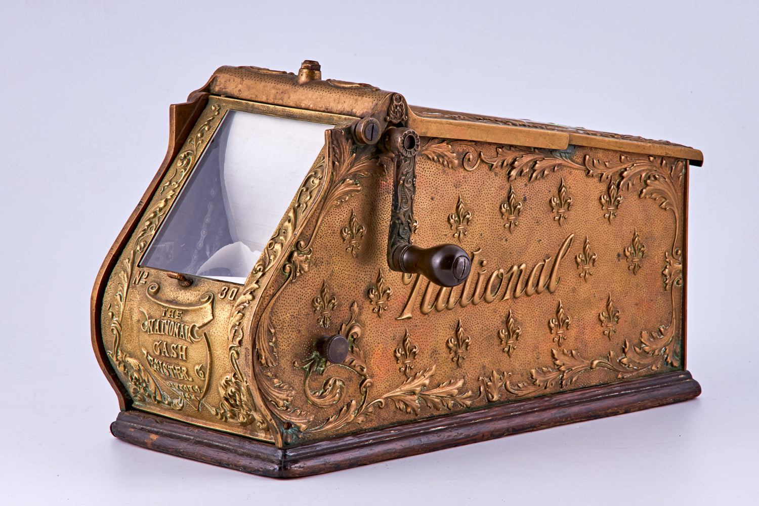 antique portable brass cash register, signed “The National Cash Register Payton O. U.S.A.” by “National”