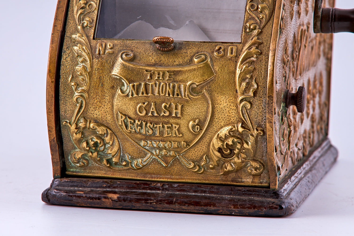 antique portable brass cash register, signed “The National Cash Register Payton O. U.S.A.” by “National”