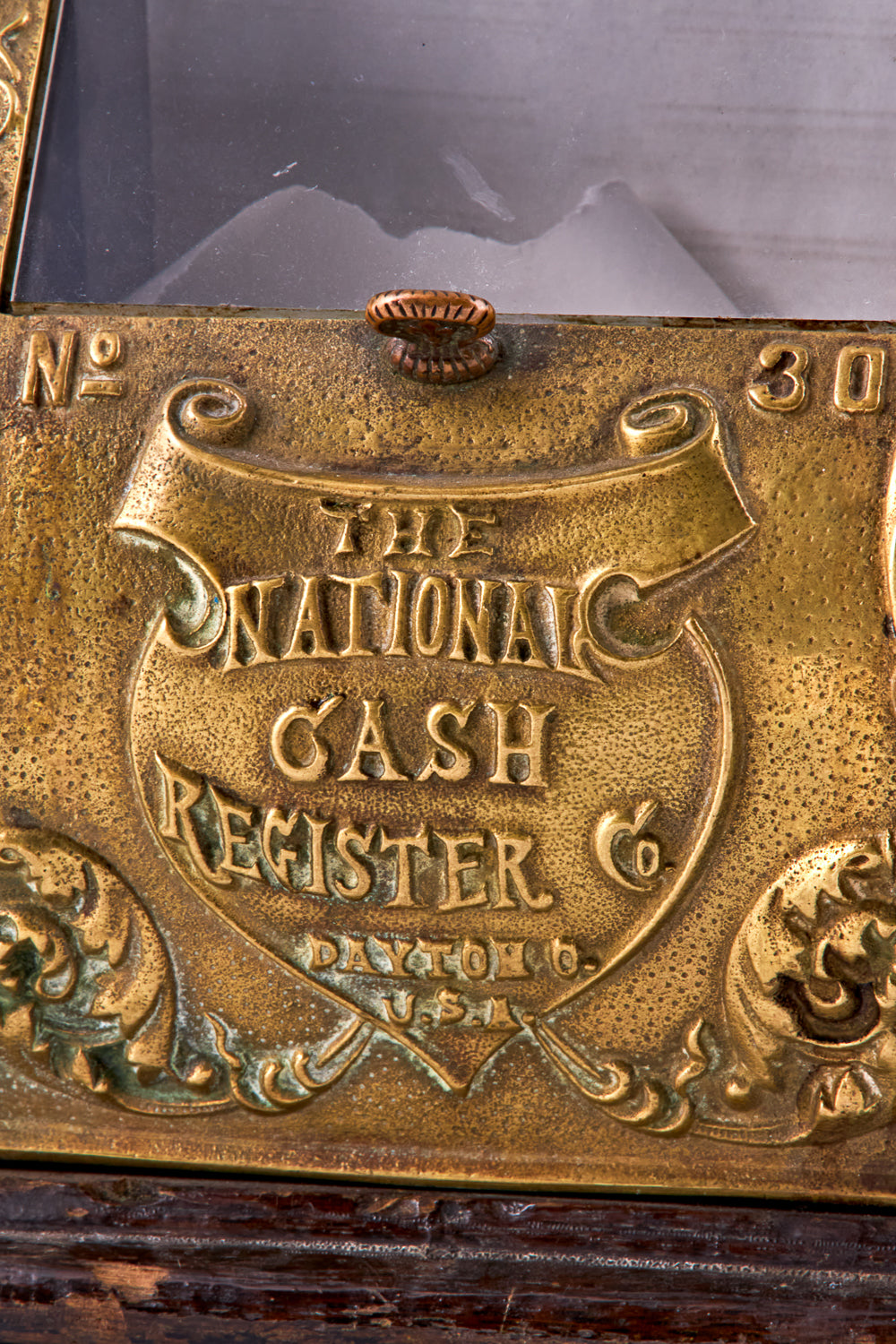 antique portable brass cash register, signed “The National Cash Register Payton O. U.S.A.” by “National”
