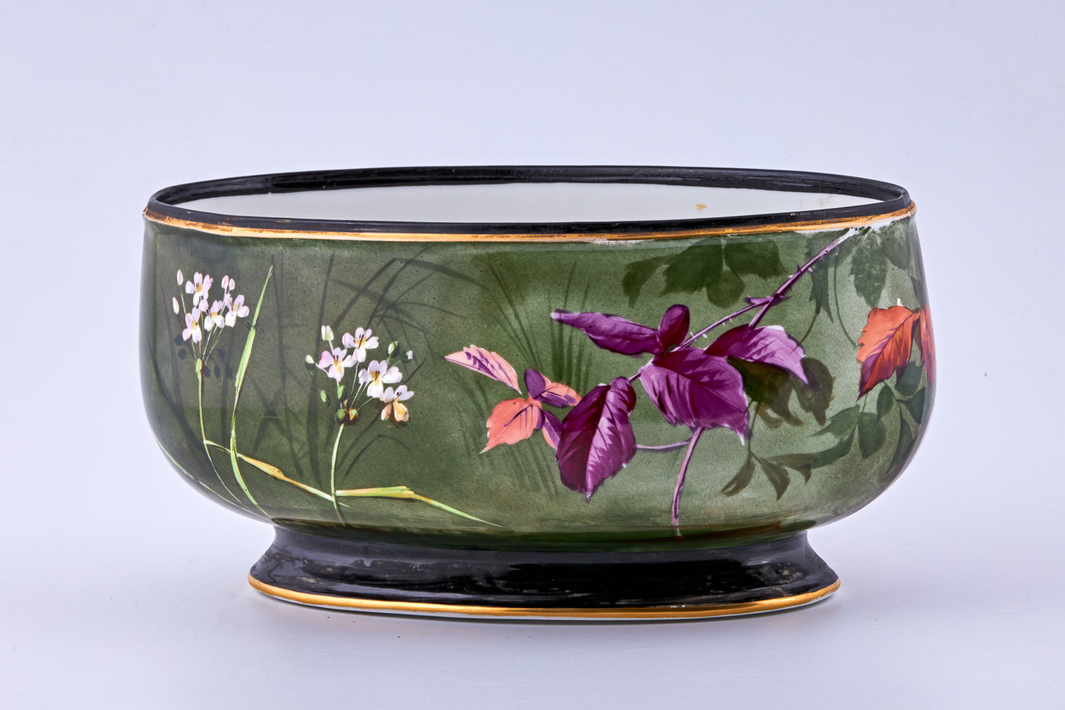 Antique Old Paris hand-painted porcelain flower pot showcases delicate floral motifs enhanced with subtle gold-painted accents