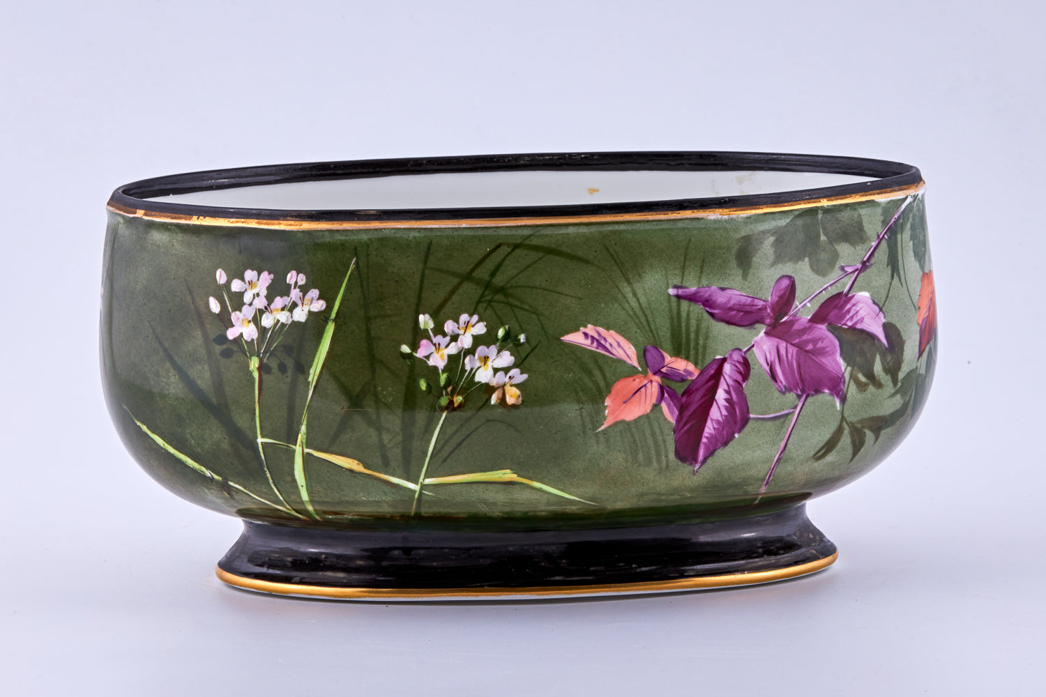 Antique Old Paris hand-painted porcelain flower pot showcases delicate floral motifs enhanced with subtle gold-painted accents