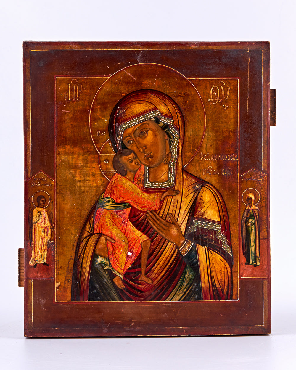 Antique tempera icon on birch wood depicts the Feodorskaya Mother of God, a revered subject in Russian Orthodox tradition