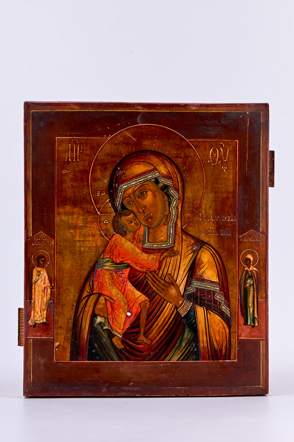 Antique tempera icon on birch wood depicts the Feodorskaya Mother of God, a revered subject in Russian Orthodox tradition