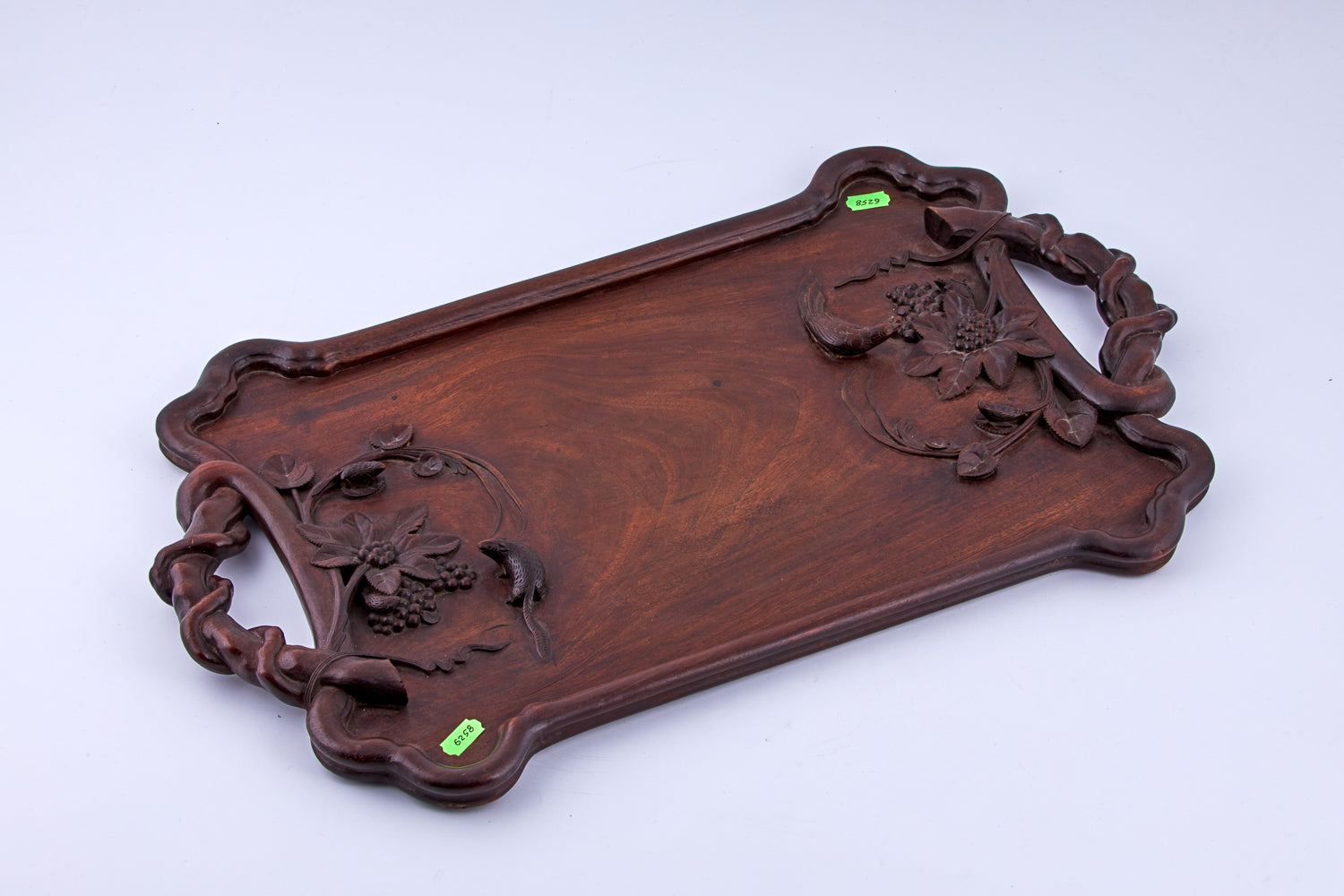 Antique Art Nouveau mahogany platter features a leaf and grape design