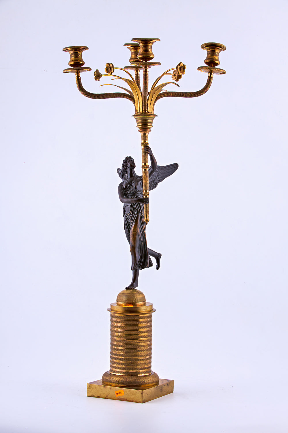 Candelabra from the late 19th century is crafted in bronze with a gold-plated finish