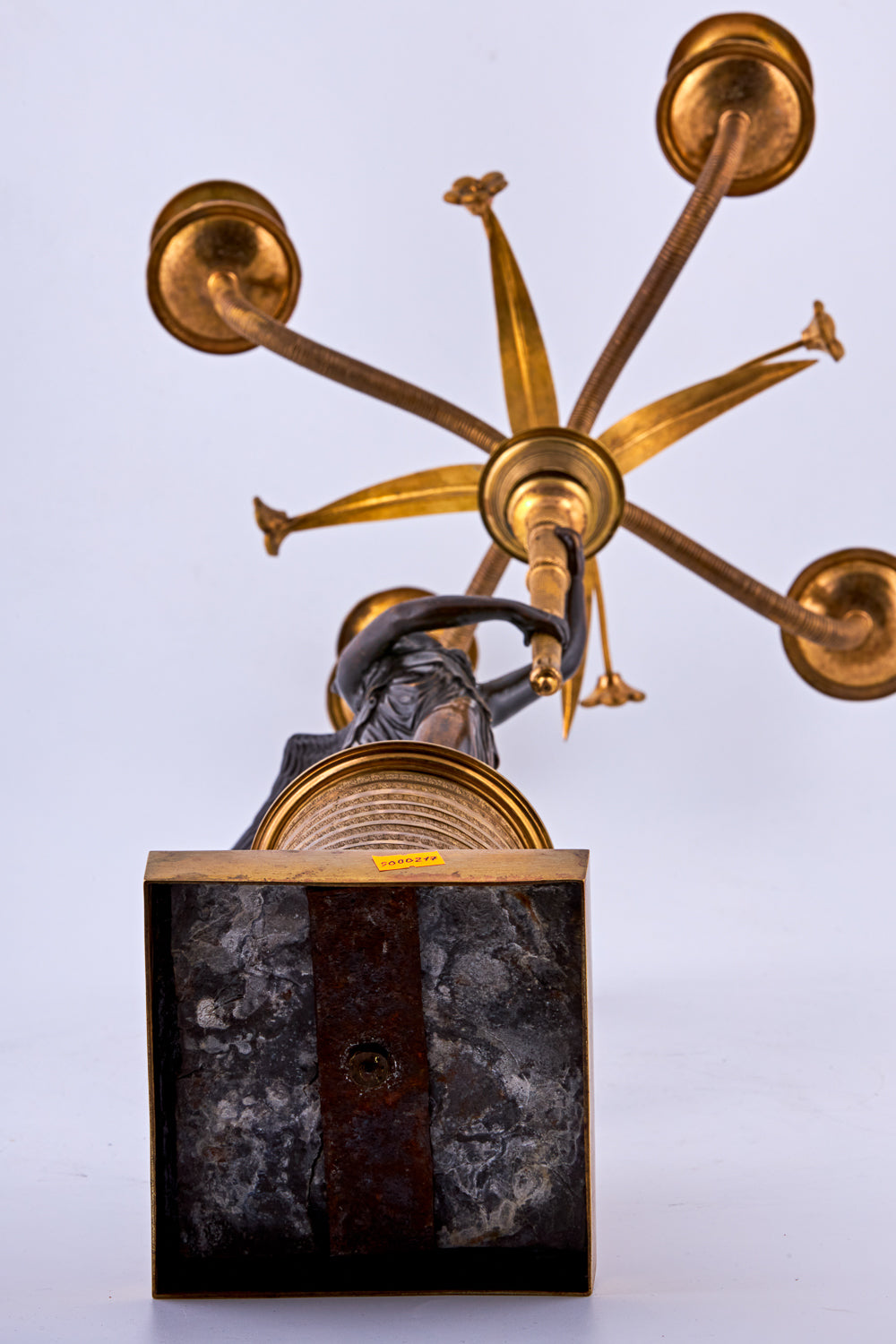 Candelabra from the late 19th century is crafted in bronze with a gold-plated finish