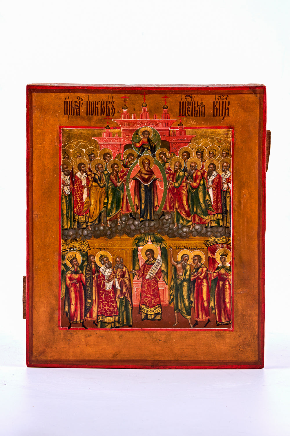 A hand-painted icon of “The Intercession of the Theotokos,” crafted with tempera and gold on birch wood