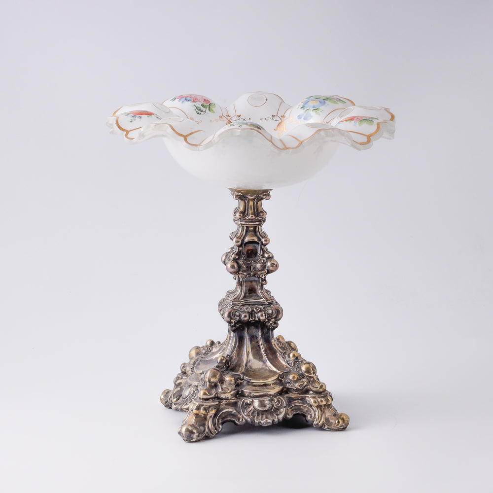 A 19th-century European milk glass fruit vase on a neo-Baroque design silver shank