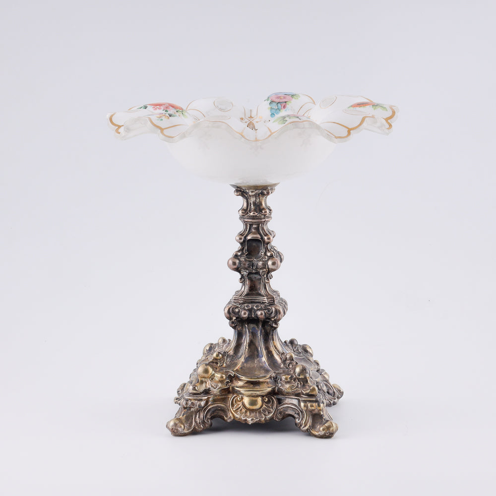 A 19th-century European milk glass fruit vase on a neo-Baroque design silver shank