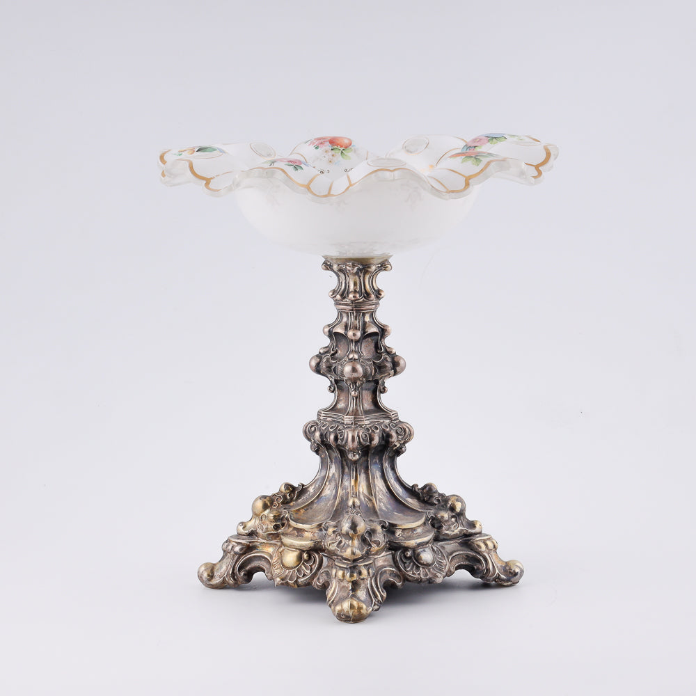 A 19th-century European milk glass fruit vase on a neo-Baroque design silver shank