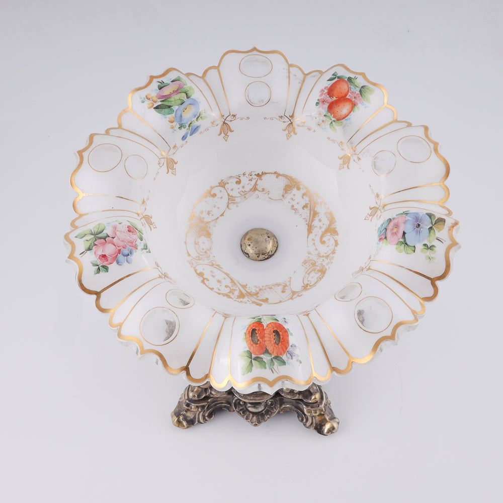 A 19th-century European milk glass fruit vase on a neo-Baroque design silver shank