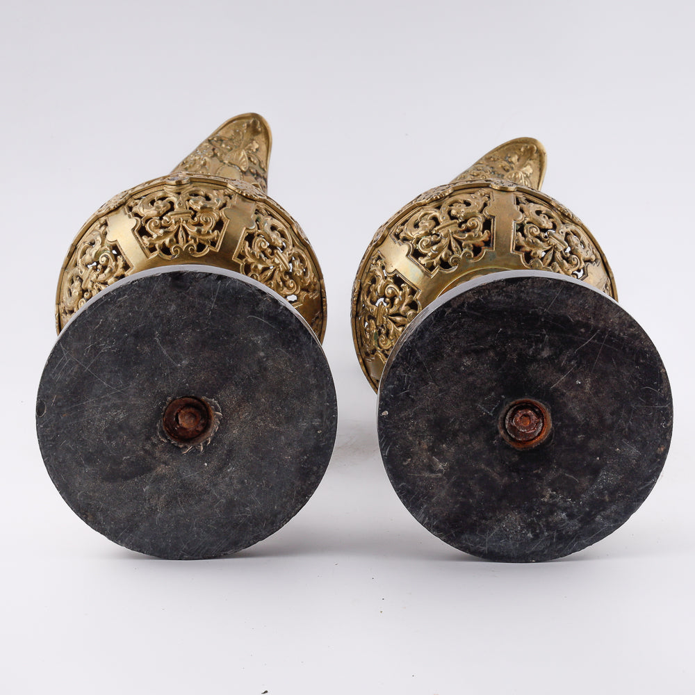 A pair of antique 20th-century decorative vases featuring Asian-inspired design