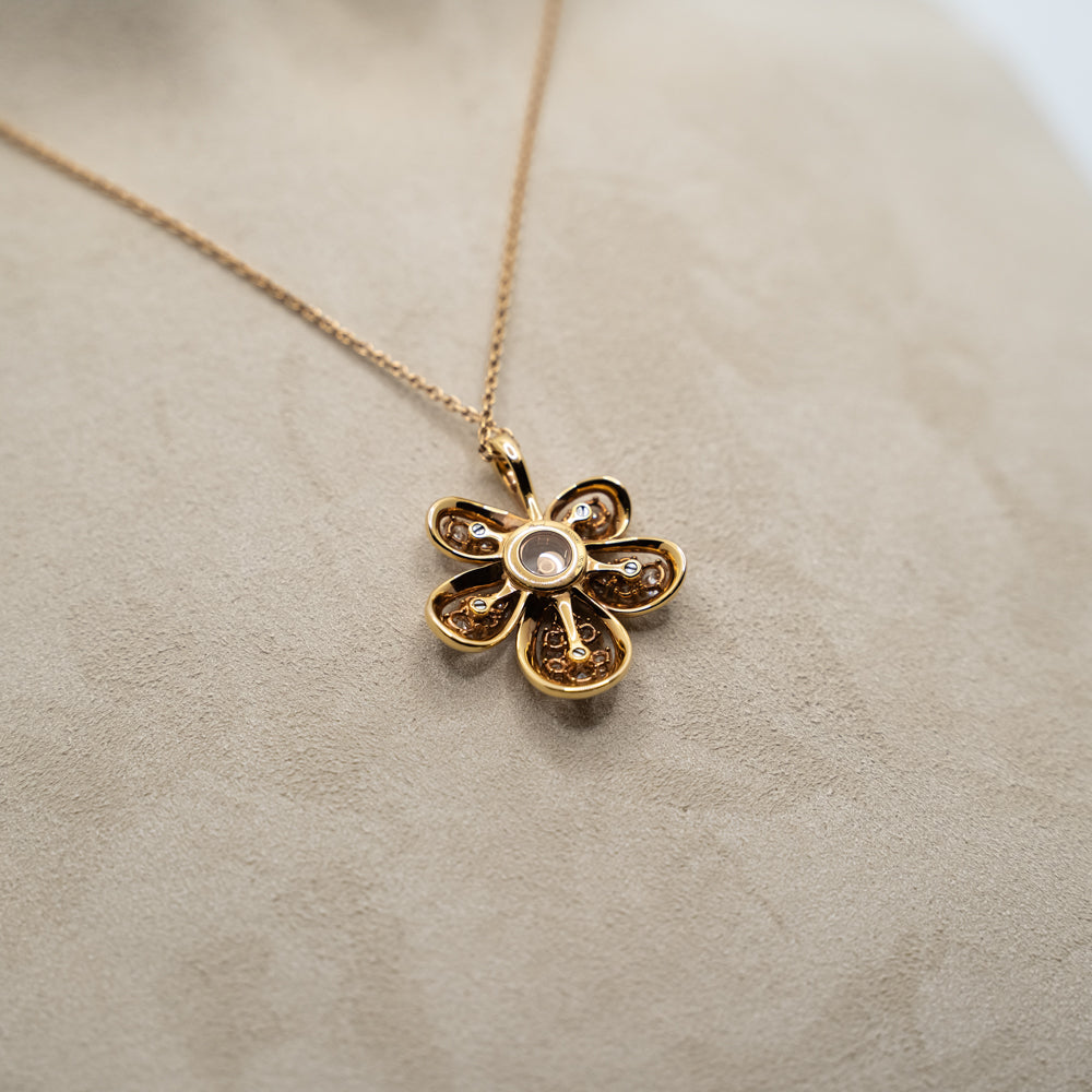 Chopard 18k gold Happy Diamonds pendant from "Joaillerie" collection