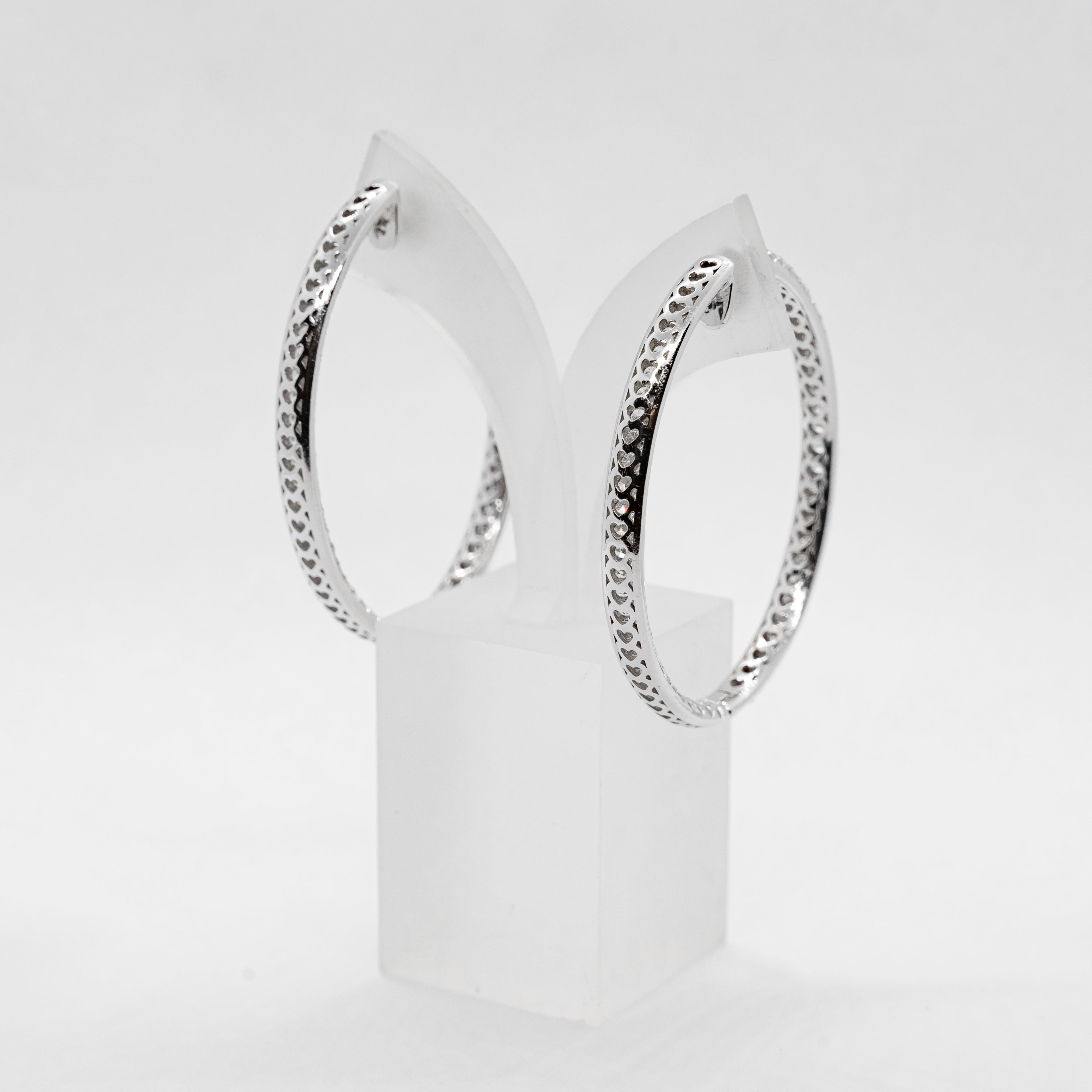 18k white gold hoop earrings set with 6,4 TCW of natural diamonds