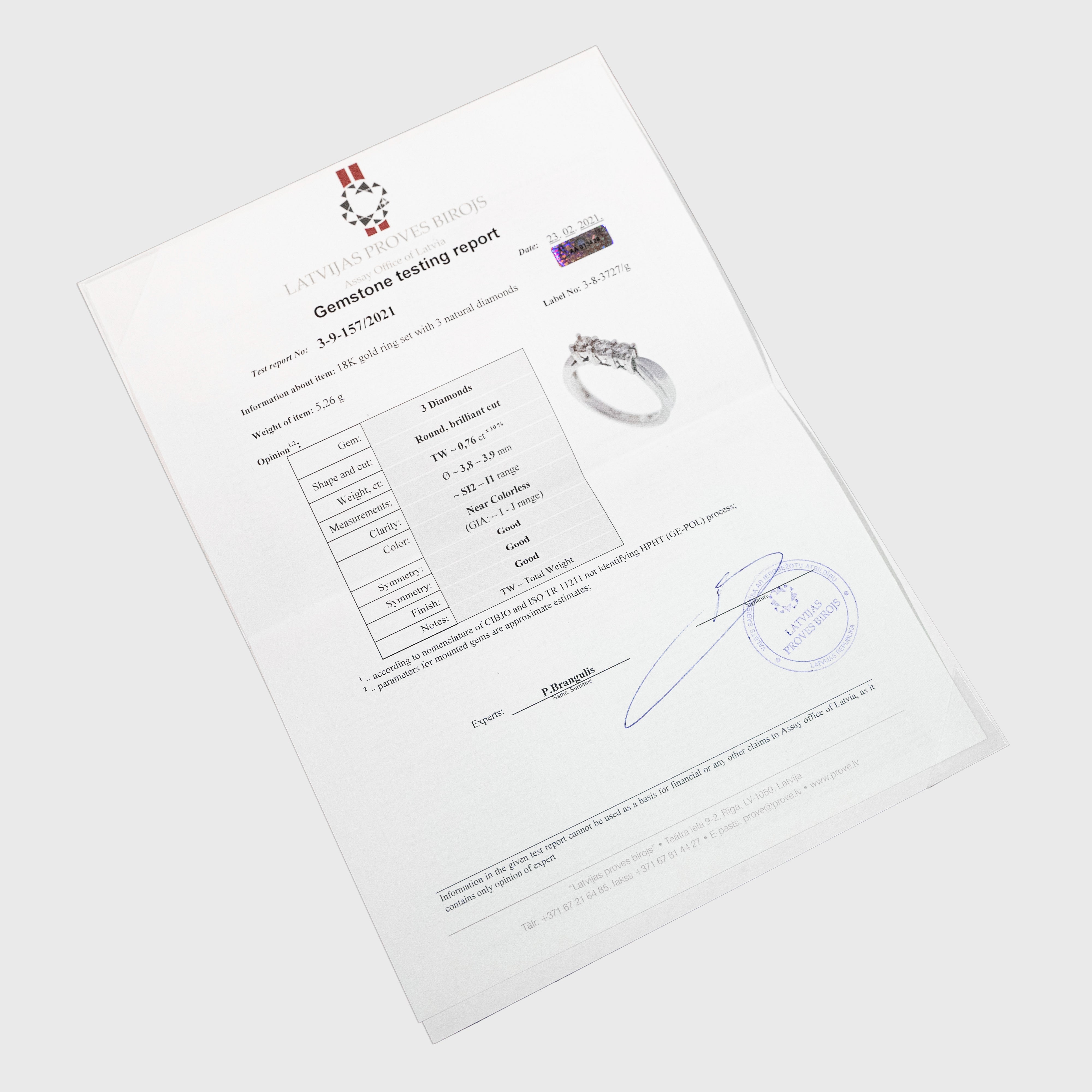 18k white gold "Past, Present, Future" ring set with three natural diamonds