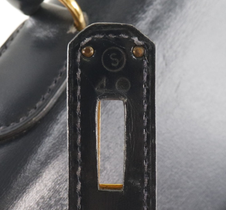 Hermés Kelly 25cm Correa de piel de becerro azul marino y con caja