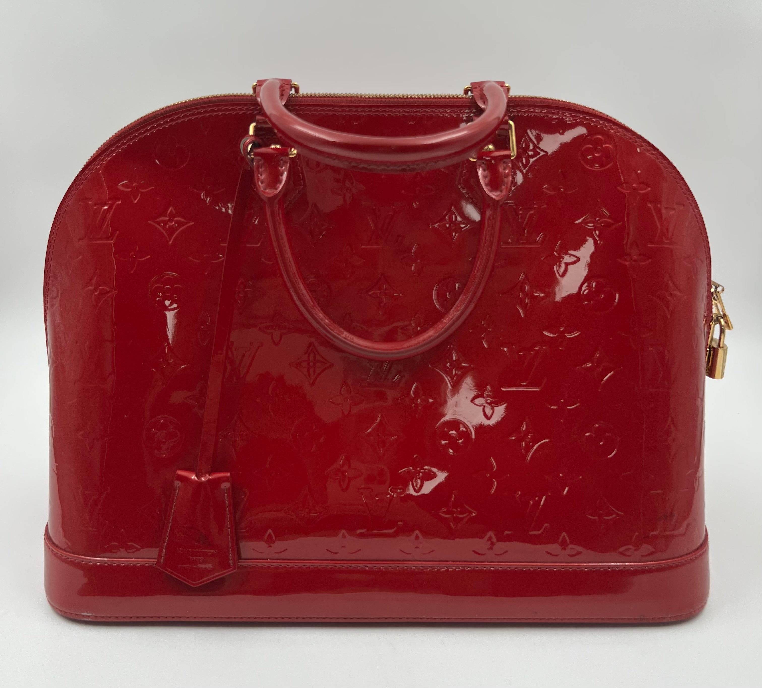 Louis Vuitton Monogram Vernis leather Alma MM handbag in red color